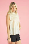 Cream Sleeveless Ruffle Top